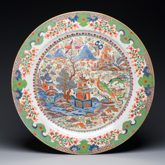 An exceptionally large Chinese English-decorated blue and white dish with 'mythical animals', Qianlong