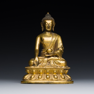A Sino-Tibetan gilt bronze Medicine Buddha or Bhaishajyaguru, 16th C.