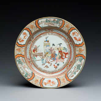 A Chinese famille rose plate with musicians playing the drums, Yongzheng