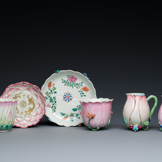 Two Chinese relief-decorated famille rose 'lotus' cups and saucers and two jugs, Yongzheng