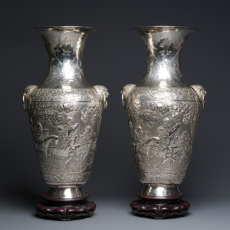 A pair of Chinese silver vases depicting 'Guo Ziyi's birthday', Qingyun 慶雲 mark, 19th C.