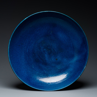 A very large Chinese monochrome blue-glazed dish, Kangxi