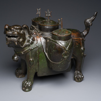 A large Chinese bronze 'touhu' or arrow vase in the shape of a lion, Ming