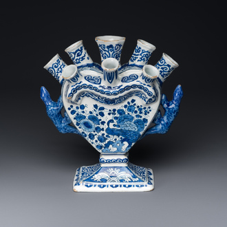 A Dutch Delft blue and white tulip vase with peacocks in a garden, 17/18th C.