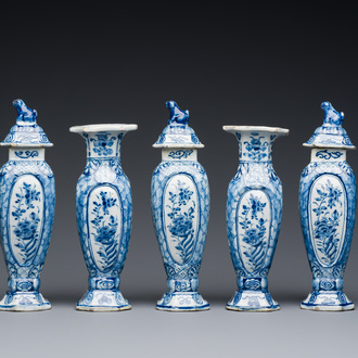 A small blue and white Dutch Delft garniture of five vases, 18th C.