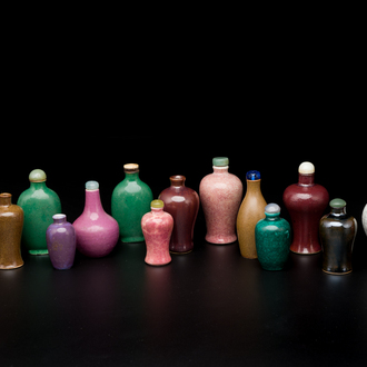 Sixteen Chinese polychrome porcelain snuff bottles and miniature vases, 18/20th C.