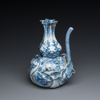 A Chinese blue and white 'pomegranate' kendi with gilt highlights, Wanli