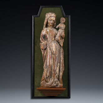 A polychromed carved wood figure of a Madonna and Child, Southern Netherlands, 14/15th C.