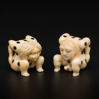 A pair of erotic subject dice in ivory with ebony inlay, Germany, late 17th C.