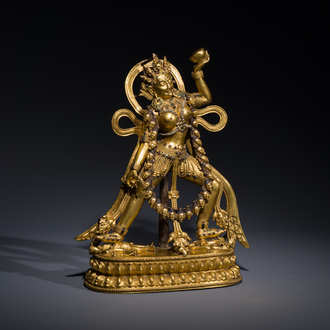 A Tibetan gilt bronze sculpture of Sarvabuddha Dakini, probably 15th C.