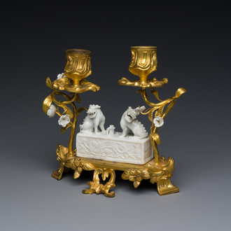 A Chinese Dehua blanc de Chine joss stick holder with French gilt bronze candlestick mounts, Kangxi and 18/19th C.