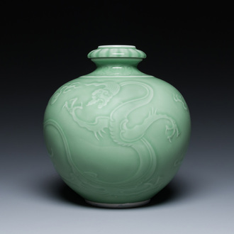 A Chinese monochrome celadon-glazed 'dragon' vase, 19th C.