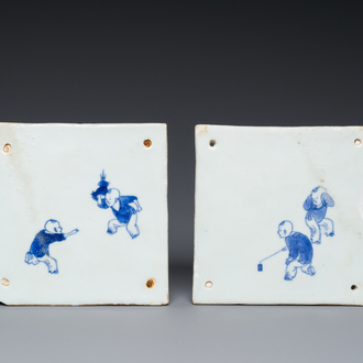 Two very rare Chinese blue and white 'playing boys' tiles, Kangxi