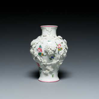 A Mennecy vase with applied floral design, France, DV mark, 18th C.