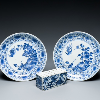 A pair of Japanese blue and white plates and a rectangular pounce pot, Arita, Edo, 18th C.