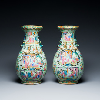 A pair of Chinese Canton famille rose celadon-ground vases, 19th C.