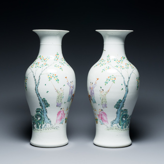 A pair of Chinese famille rose 'playing boys' vases, Qianlong mark, Republic