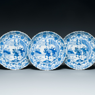 Three Japanese blue and white 'Mongolian hunt' plates in Chinese Kangxi-style, Edo, 18th C.