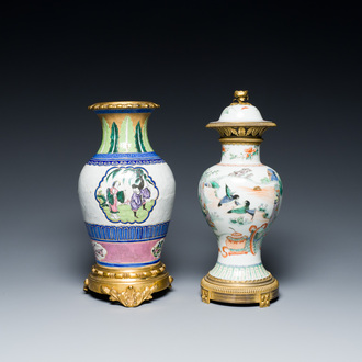 A Chinese famille verte vase and an enamelled Yixing stoneware vase with gilt bronze mounts, 19th C.