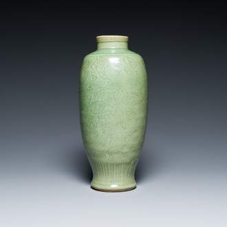 A Chinese Longquan celadon vase with underglaze floral design, Ming