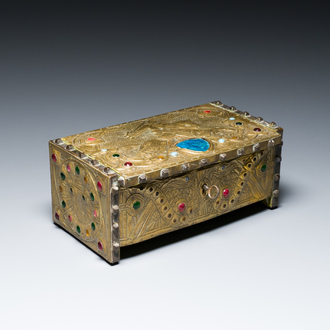 Alfred Daguet (Paris, 1875-1942): A Gothic revival repoussé brass and copper-mounted metal box with glass cabochons, dated 1907