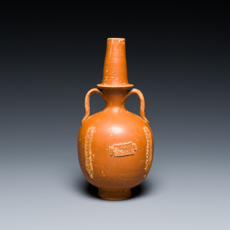 A Roman red slipware 'amphoriskos' flask with palms and an applied text band, Northern Africa, 1st/3rd C.