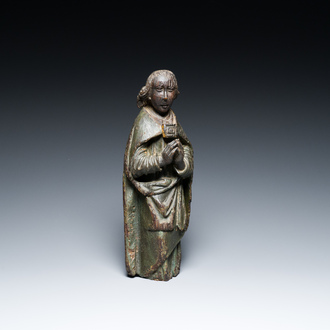 A polychromed wood sculpture of an angel, Southern Netherlands, probably Tournai, 14/15th C.