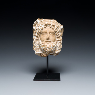 A Punic terracotta head of Serapis with traces of white engobe, Northern Africa, 2nd C. b.C.