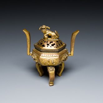 A Chinese gilt bronze tripod censer, 18/19th C.