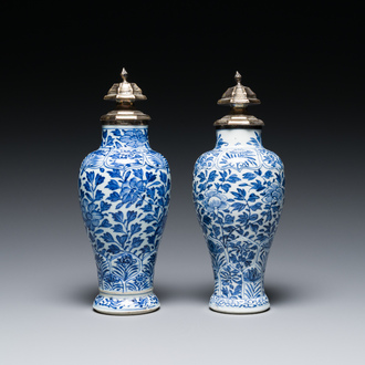 A pair of Chinese blue and white vases with silver mounts, Kangxi