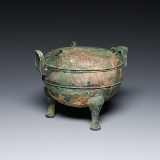 A Chinese archaic bronze tripod vessel and cover, 'ding', Eastern Zhou, Spring and Autumn period