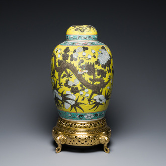 A large Chinese yellow-ground Dayazhai-style 'dragons' jar and cover on gilt bronze stand, 19th C.