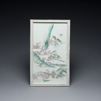 A Chinese rectangular famille rose tray with figures in a mountainous landscape, 19th C.