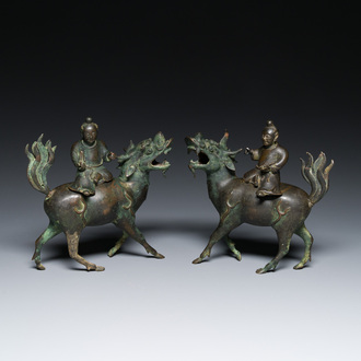 A pair of Chinese bronze 'boy on kylin' censers, Ming