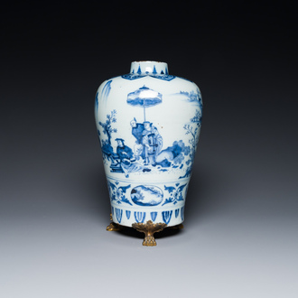 A fine Dutch Delft blue and white Transitional style chinoiserie vase on a gilt bronze stand, late 17th C.