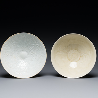 A Chinese qingbai-glazed 'phoenixes' bowl and a cream-glazed 'fish' bowl, probably Song