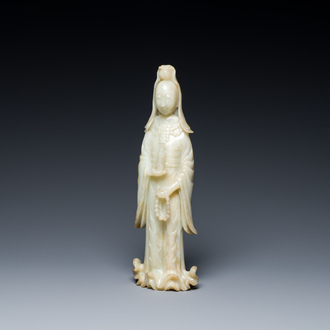 A Chinese celadon jade sculpture of Guanyin, Qing