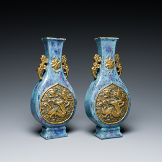 A pair of Chinese flambé-glazed vases with gilt 'dragon' medallions, Qianlong mark, 19th C.