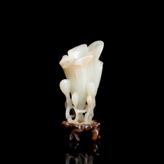 A Chinese white jade 'magnolia' carving, Qing