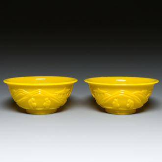 A pair of Chinese yellow Beijing glass bowls with figures in a landscape, CHINA mark, Republic