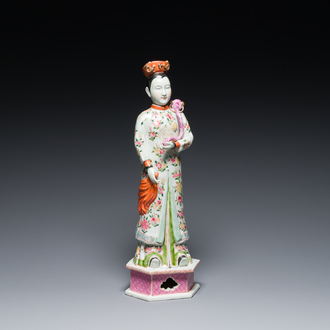 A tall Chinese famille rose 'nodding head' figure, 19/20th C.