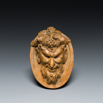 Een terracotta hoofd van een faun, gesigneerd Clodion, 19e eeuw