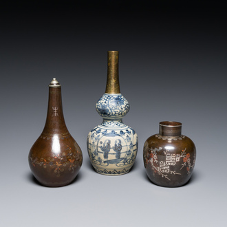 Two Vietnamese copper- and silver-inlaid paktong wares and a Chinese blue and white double gourd vase, 16th and 19th C.