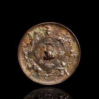 A Chinese bronze mirror, Ming
