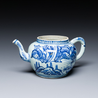 A Chinese blue and white teapot with a mountainous landscape, Transitional period