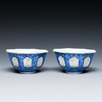 A pair of Chinese blue and white octagonal reticulated bowls, Transitional period