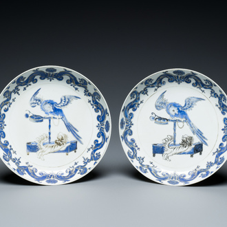 A pair of Chinese eggshell Pronk studio 'parrot and spaniel' plates, Yongzheng/Qianlong