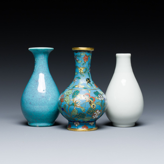 Three small Chinese bottle vases in cloisonné, white and robin's-egg-glazed porcelain, 19/20th C.