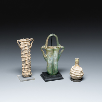 Two Roman glass balsamariums and a flask, 2nd/4th C.