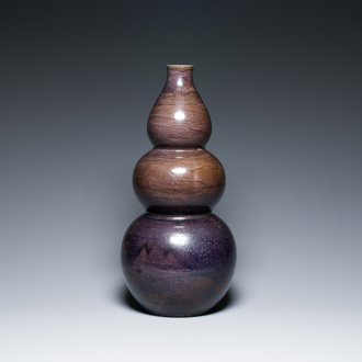 A large Chinese aubergine-glazed triple gourd vase, 18th C.